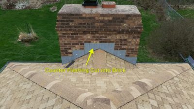 Step flashing on chimney