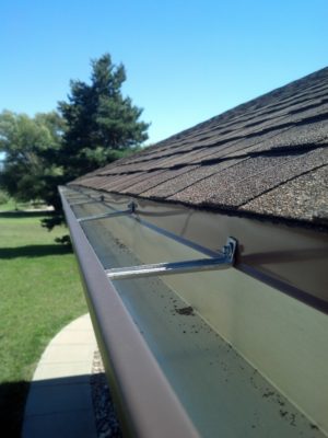 Seamless gutters on house's roof