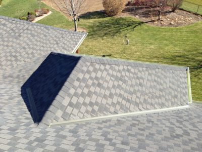 Roof with metal valleys